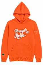 An orange pullover hoodie with a front kangaroo pocket and a large white 'Prayer Helps' graphic on the chest, shown against a plain white background.